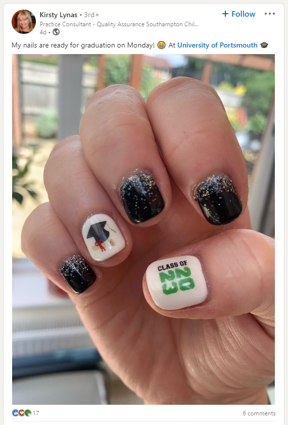 Image of a graduates hand with celebratory Class of 2023 nail art