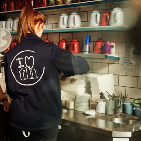 Staff member working behind counter
The Tenth Hole - City Guide 2022