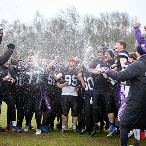 American Football Team celebrating promotion