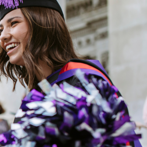 Smiling graduates at Guildhall