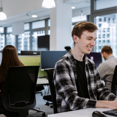 Student using a computer in the Future Technology Centre, University of Portsmouth