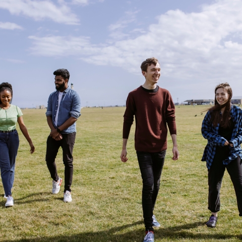 A group of sudents hanging out on the common