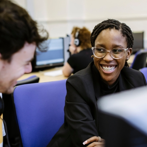 Woman smiling in Language Lab