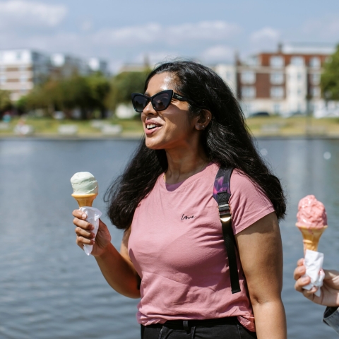  Students enjoying ice cream in the park