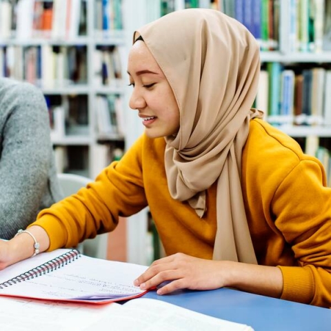 students in library