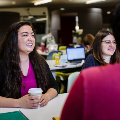 Students studying in group in library