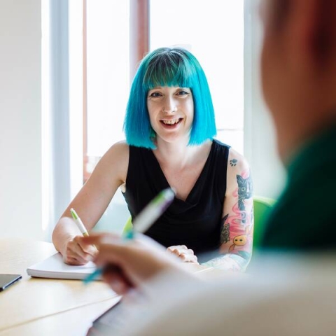 Student with blue hair