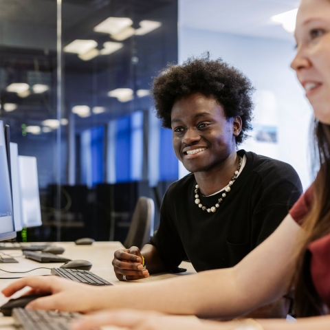 Two students typing on desktop computersTechnology Facilities Day One  - NOT FOR THIRD PARTY - CONSENT