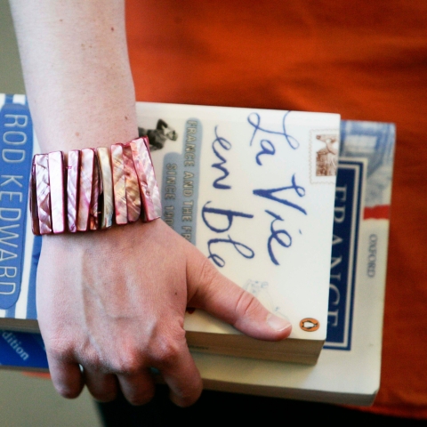 English student holding books