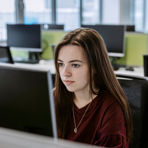 Female student using computer