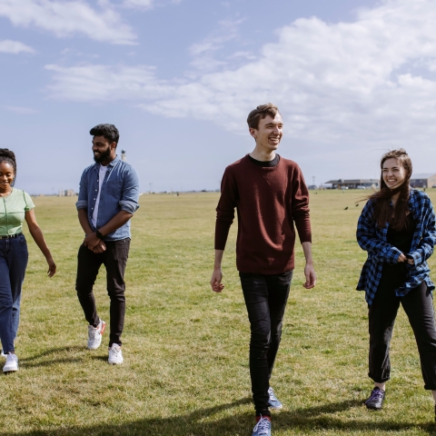 A group of sudents hanging out on the common