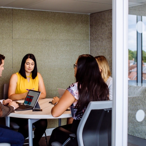 Staff meeting in meeting room