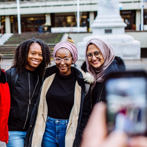 group of students in front of Portsmouth Guildhall