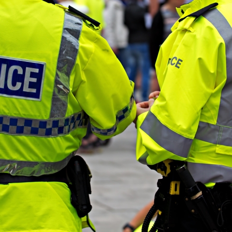 Two police officers in high visibility uniform