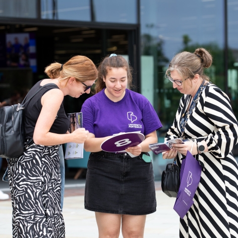 Student ambassador talking and helping visitors  - Open Day 2023