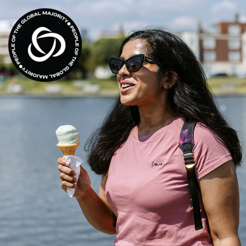 People of the Global Majority teaser image showing a student outside eating an ice cream