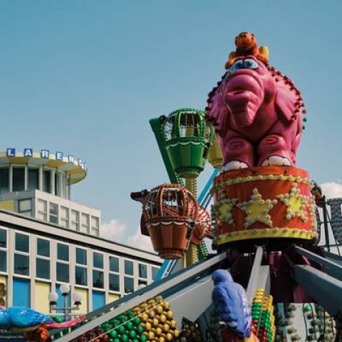 Side of Clarence Pier with a fairground ride