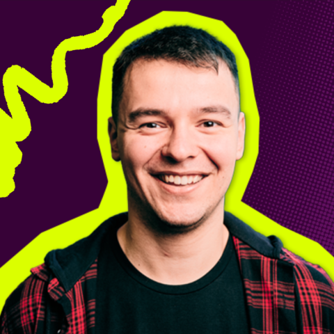 A man in a plaid shirt smiling. He is highlighted by a yellow line around hime. The background in dar purple with a yellow squiggly line. 