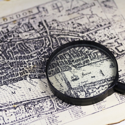 Ancient London map with a magnifier