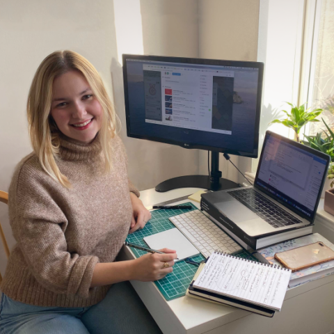 Vanessa sitting at desk