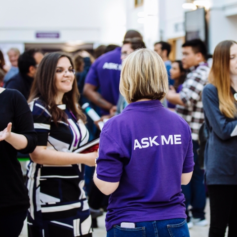 Postgraduate students and staff at an open evening