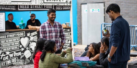 students at food stalls