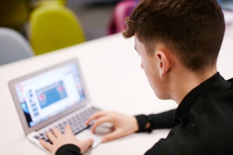 opening emails on a laptop