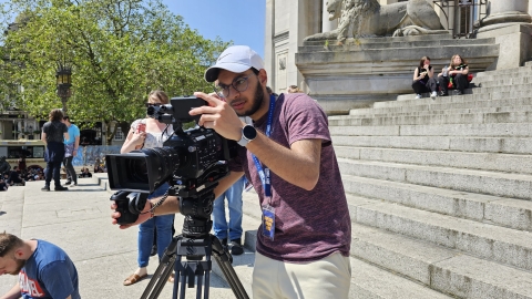 Student working with TV and film camera