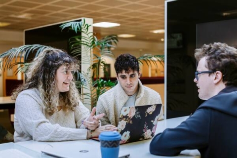 Students sat at table talking