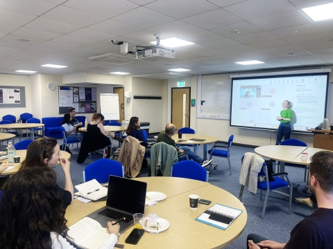 Students attending a session in a University training room