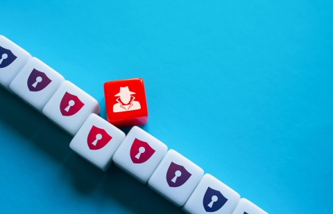 An image of Portsmouth Harbour with a ferry in the foreground and the Spinnaker Tower in the background