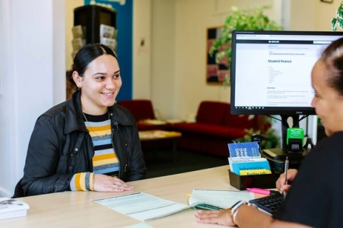 Female student talking to Student Finance