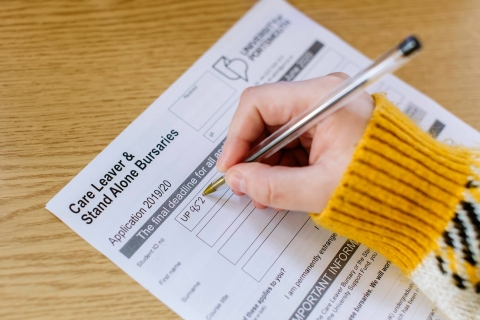 Student filling out a form