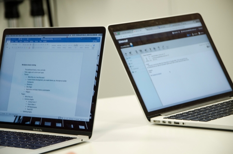 A close up of a couple of computers