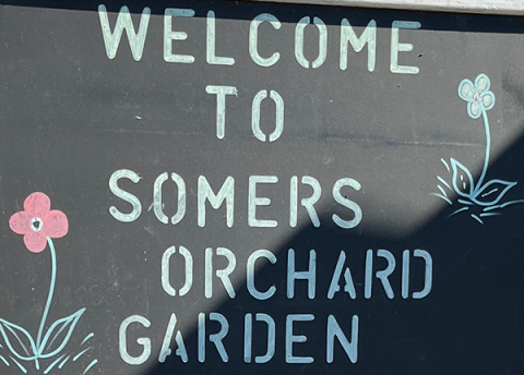 Sign that says Welcome to Somers Orchard Garden