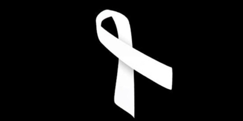 White ribbon on black background