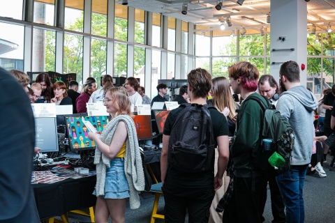 people in eldon lobby for graduate show 2024