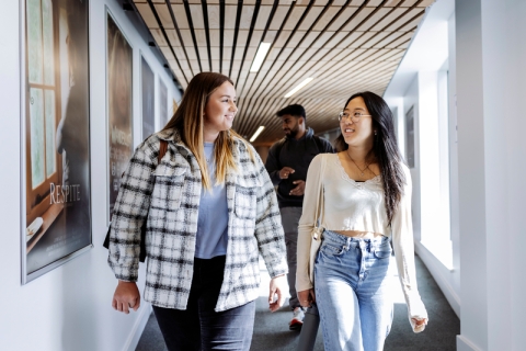 Students walking down a corridor in Eldon building