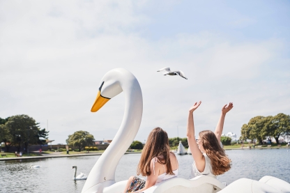 Students riding on Swan pedalo