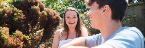 students chatting rock garden