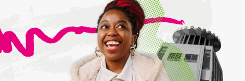 Woman smiling behind white background