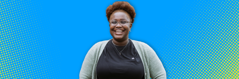 A cutout image of a woman wearing a black top and grey cardigan. The background is bright blue with a fluro dot design. 