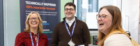 Student at a careers fair interacting with employers