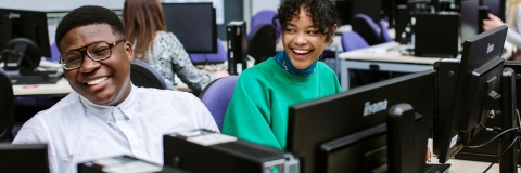 Accounting students enjoying studying in suite