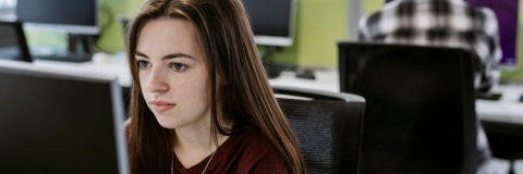 Female student using computer