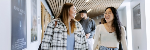 Students walking down a corridor in Eldon building