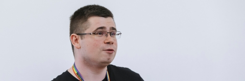 Photo of Kris Nolan speaking at event.- Festival of Doctoral Research