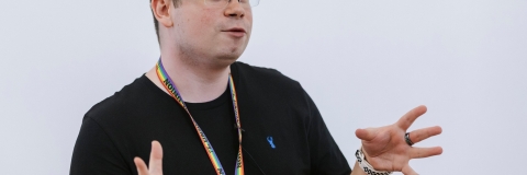 Photo of Kris Nolan speaking at event.- Festival of Doctoral Research