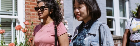 Two students walking past houses to rent in Portsmouth 