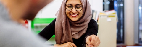 Students using text books to study